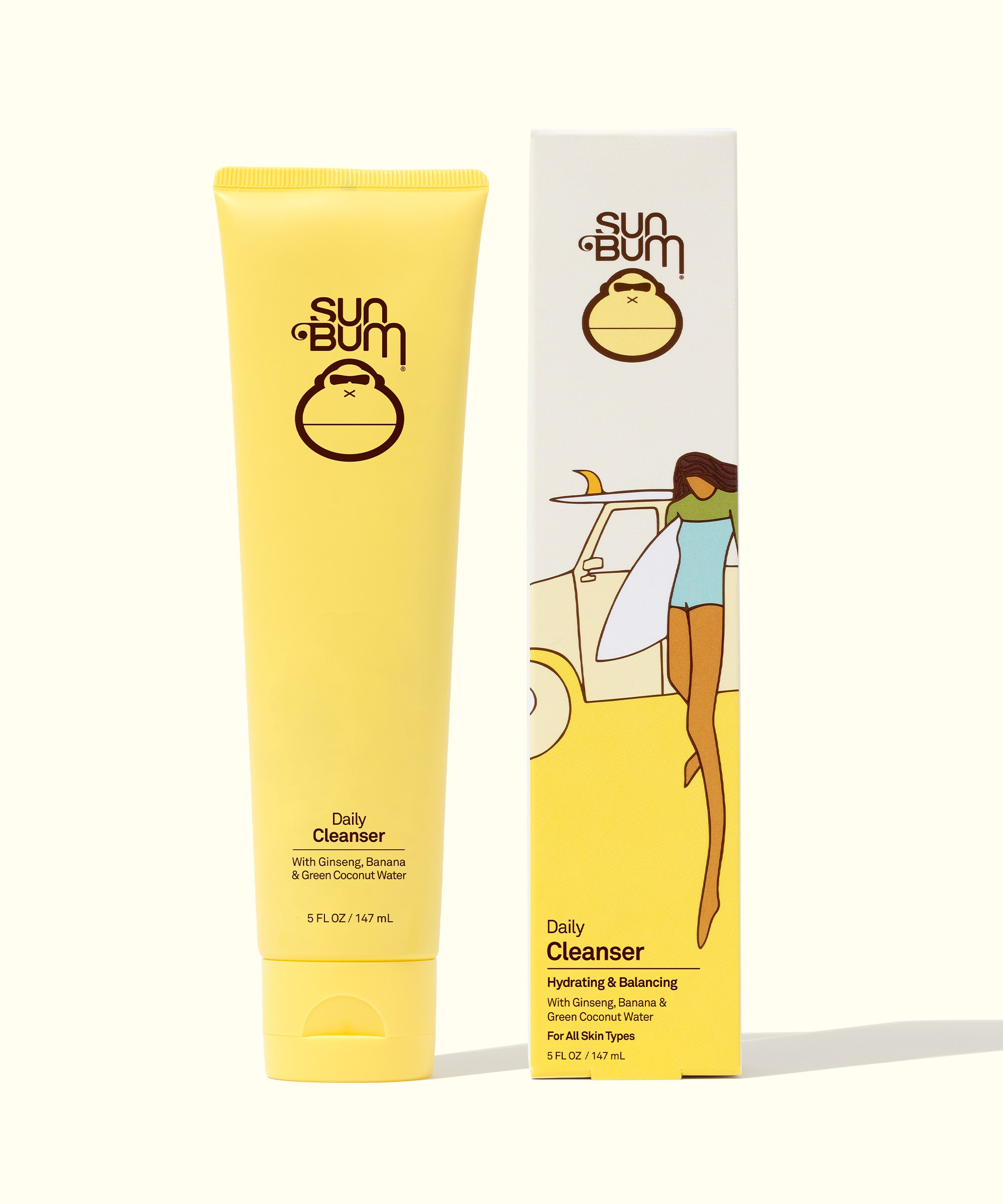 Yellow tube and box of Sun Bum Daily Cleanser, infused with Ginseng, Green Coconut Water, and Banana for gentle and hydrating skin cleansing, Sun Bum.