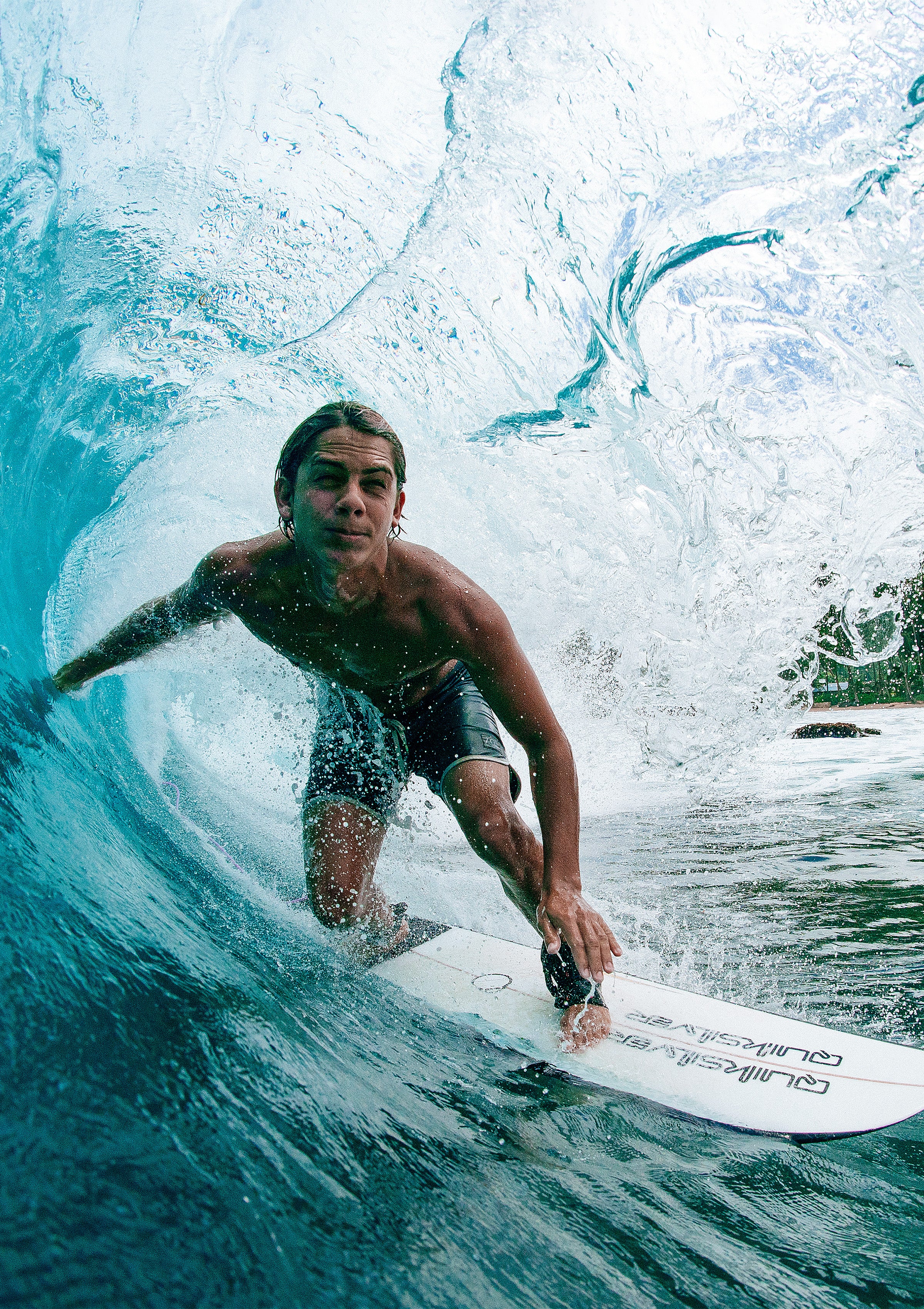 Sun Bum Australian Ambassador Lungi Slabb surfing a barrel 