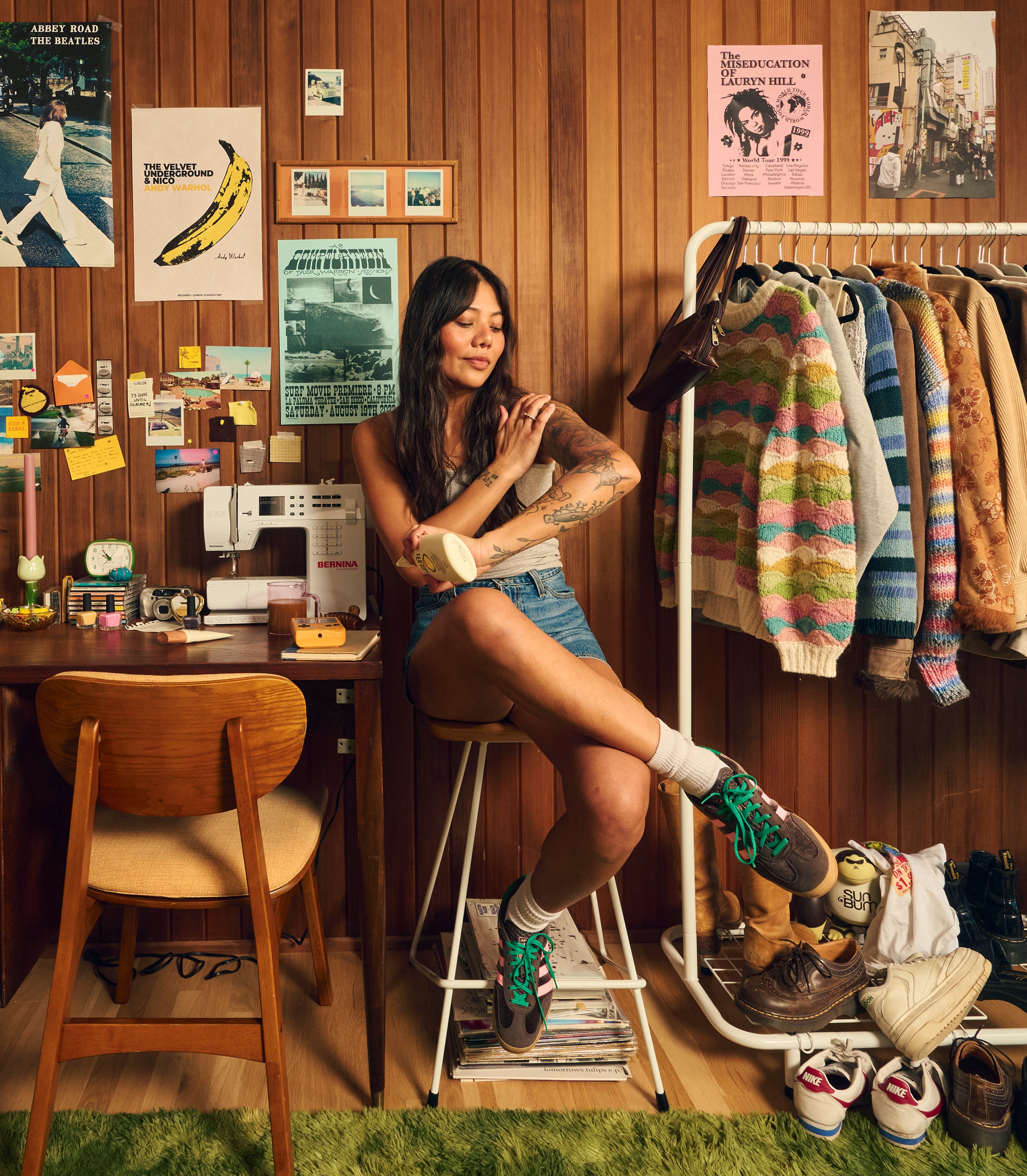 Woman applying sunscreen in a cozy, vintage-style room featuring the SB Daily Sunscreen Collection – Sun Bum.